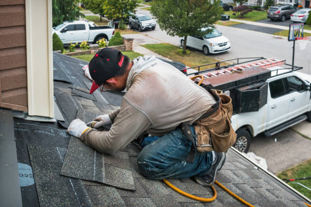 Professional Emergency Roof Repair technician working in Pointblank, TX